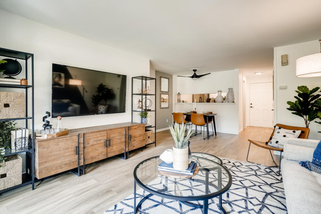 Living Room area with view of front door and slight view of the kitchen