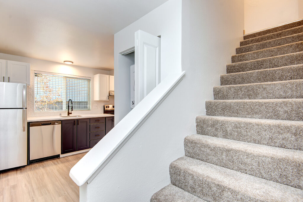 staircase next to the kitchen